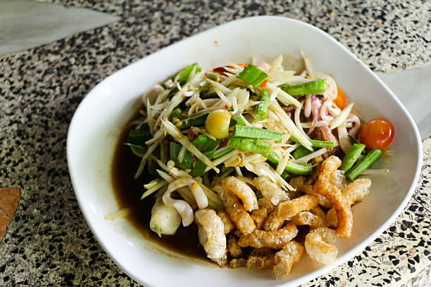 istock spicy papaya salad with salted crab and fermented fish 629707496