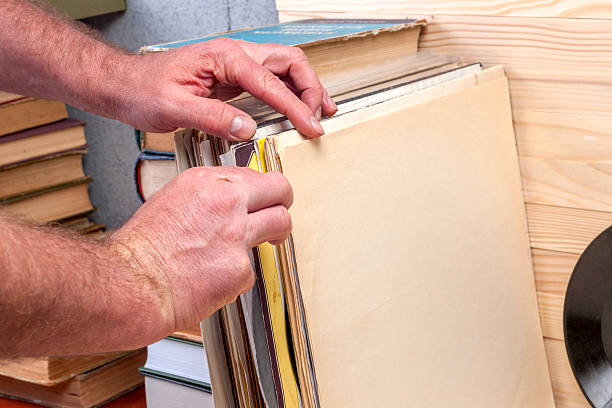 istock Browsing through vinyl records collection. Music background. Copy space 629713782