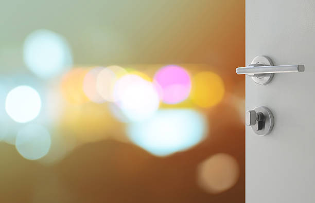 istock opened white door to abstract background with bokeh lights 629719206