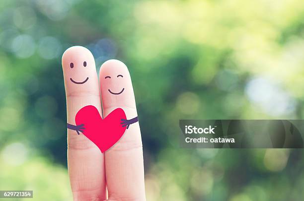 Happy Loving Fingers Holding Red Heart Stock Photo - Download Image Now - Love - Emotion, Romance, Couple - Relationship