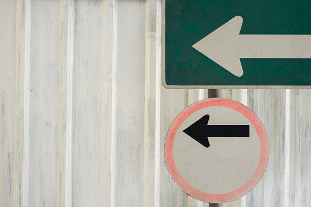 istock old two left sign in front of white galvanized sheet 629725762