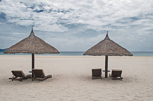 istock Straw parasols in the beach 629729740