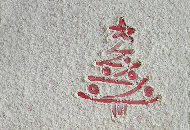 istock Christmas tree on flour background. White flour looks like snow 629730042