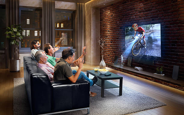 istock Adults watching Bicycle race at home 629735120