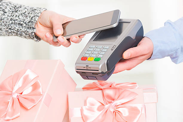 istock Paying contactless with smart phone 629736022
