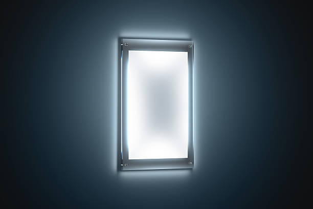 Blank white a3 poster mockup in illuminated glass holder