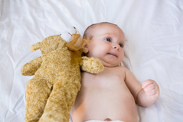 istock Baby lying on baby bed 629737048