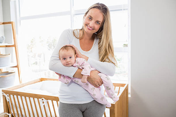 istock Mother holding her baby boy 629737644