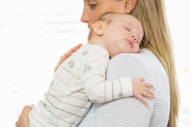 istock Mother holding and embracing her baby boy 629737838