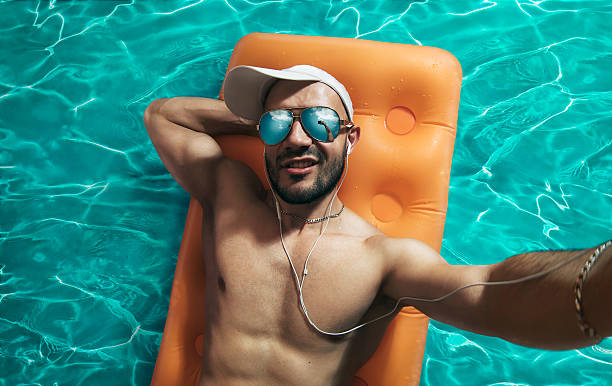 istock man sunbathing on an air mattress 2 of 2 629743066