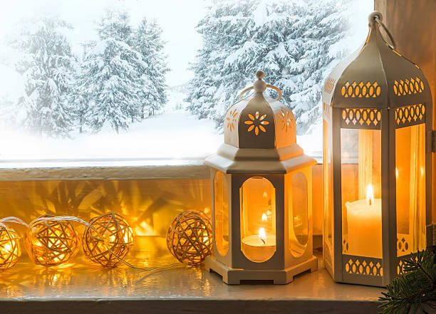 istock Winter decoration with lanterns on windowsill 629743730