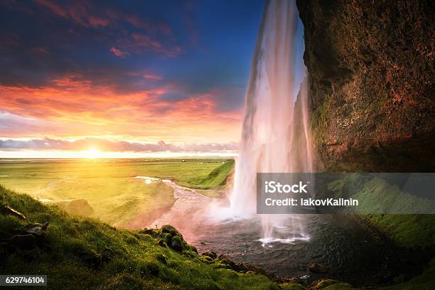 Seljalandsfoss Waterfall At Sunset Iceland Stock Photo - Download Image Now - Seljalandsfoss Waterfall, Waterfall, Rainbow