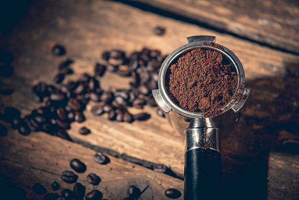 istock Ground coffee in porta filter holder 629757914