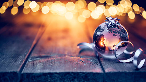 istock Earth globe on old table - Christmas Celebration Defocused wood 629758870