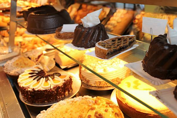 istock Baker counter with cakes and pies 629759894