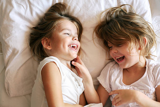 istock Sisters sharing moments of love. 629761588