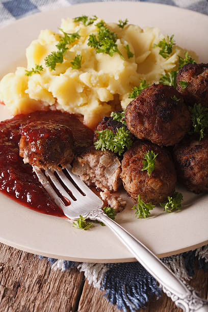 istock Swedish food: meatballs kottbullar, lingonberry sauce and mashed 629762584