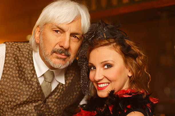 istock Retro pub celebration  Young woman and active stylish senior man 629764456