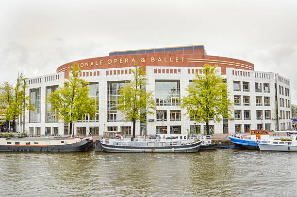 View at the dutch National opera and ballet Amsterdam, the Netherlands - September 17, 2015: View at the dutch National opera and ballet building close to canal stopera stock pictures, royalty-free photos & images