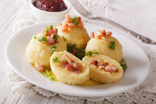 istock potato dumplings with bacon, butter and parsley close-up 629765546