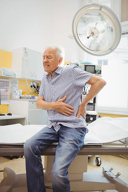 istock Mature man with lower back pain 629767162