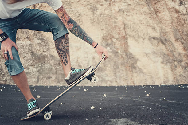 istock Man doing skateboard trick outdoor. 629767926