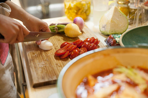 happy japanese mother cooking for family and friends - prepared vegetable imagens e fotografias de stock