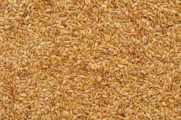 istock Prepared Golden linseed for cooking, Linseed background and textured 629768844