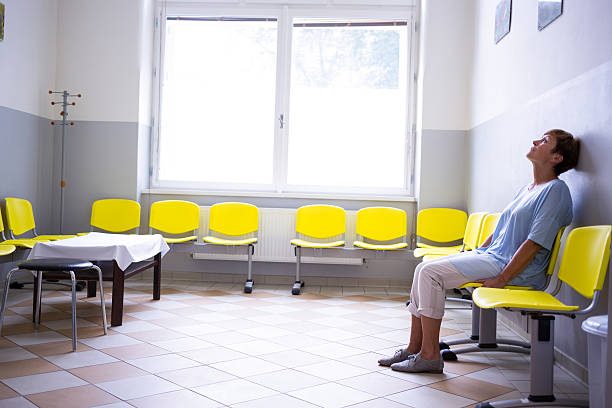istock Patient sitting in a waiting room 629772376
