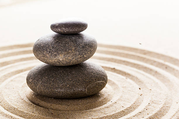 istock zen garden meditation stone background 629772502