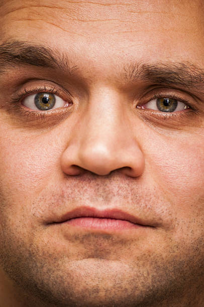 istock Surprised, squinting, questionable man. Facial expression, emoji face, emotion close-up. 629775380