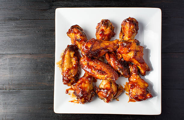 Baked chicken wings on a white plate