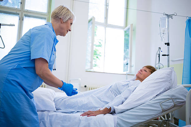 istock Nurse giving an injection to a patient 629778430