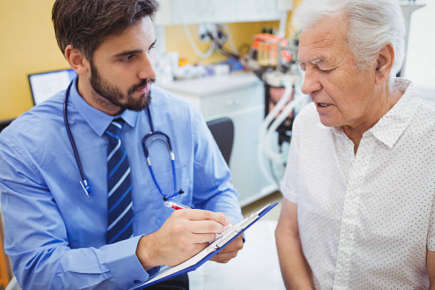 istock Patient consulting a doctor 629779298