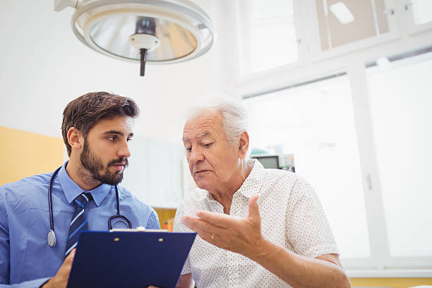 istock Patient consulting a doctor 629779428