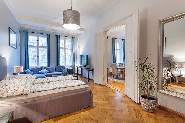 istock Modern Home with Double Doors between Bedroom and Living Room 629779436
