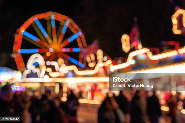 Blurred Festive Lights Of Winter Wonderland Stock Photo - Download Image Now - Traveling Carnival, Backgrounds, Traditional Festival