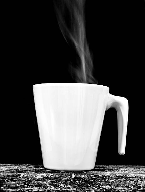 cup of coffee with black background. - hot chocolate hot drink high section close up imagens e fotografias de stock