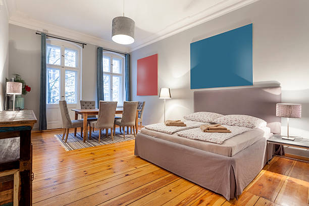 Elegant Bedroom with King Sized Bed and Dining Table