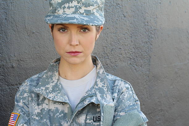 istock Woman with USA flag on army uniform 629784752