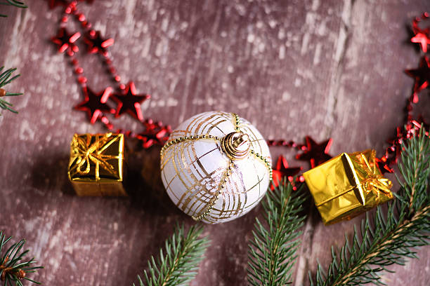 istock Christmas ball, gift boxes, bijouterie and fir tree branch 629788818