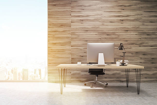 istock CEO working desk in office with wooden panels, toned 629789434