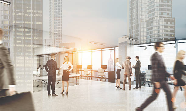 istock People walking in office. Cityscape on the foreground, toned 629789920