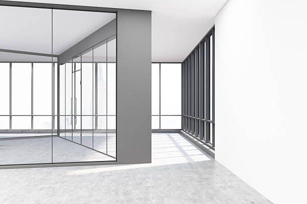 istock Empty office with glass and white concrete walls 629791470