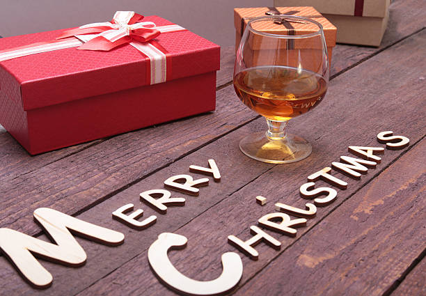 istock Merry christmas text and decorations on a wood background 629792238