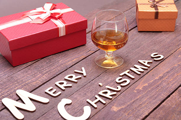 istock Merry christmas text and decorations on a wood background 629792310