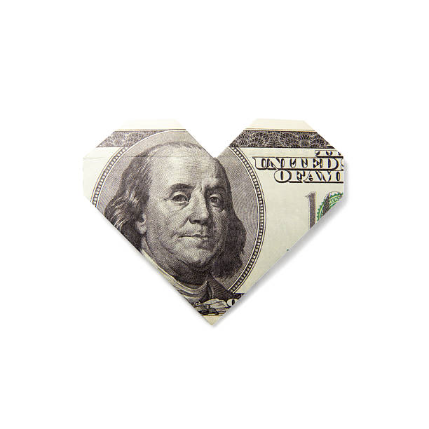istock origami heart of banknotes 629793094