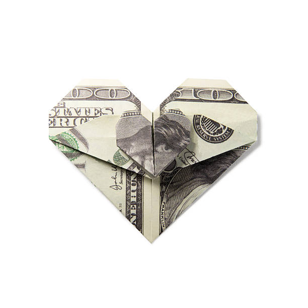istock origami heart of banknotes 629793142