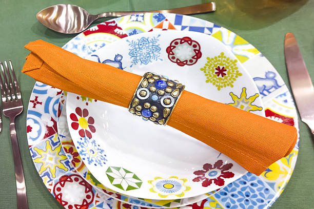 istock Colorful decorated table with plates, napkin and cutlery 629794384