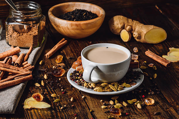 masala chai con ingredienti diversi - cardamom indian culture food spice foto e immagini stock